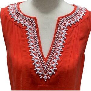 Banana republic orange top with white beads on the V-neck size 6